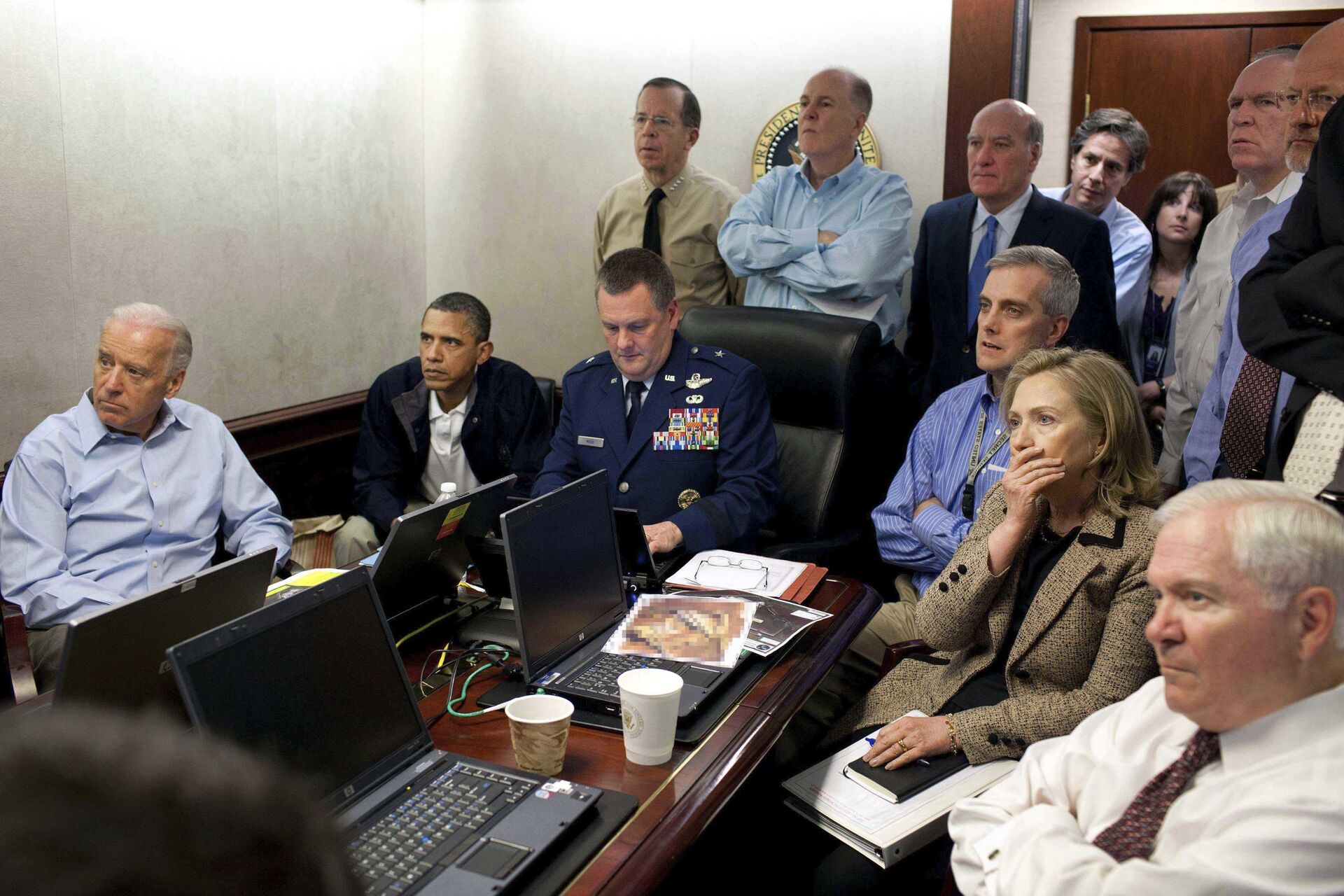 In this image released by the White House and digitally altered by the source to diffuse the paper in front of Secretary of State Hillary Rodham Clinton, President Barack Obama and Vice President Joe Biden, along with with members of the national security team, receive an update on the mission against Osama bin Laden in the Situation Room of the White House, Sunday, May 1, 2011, in Washington. - Sputnik International, 1920, 07.09.2021