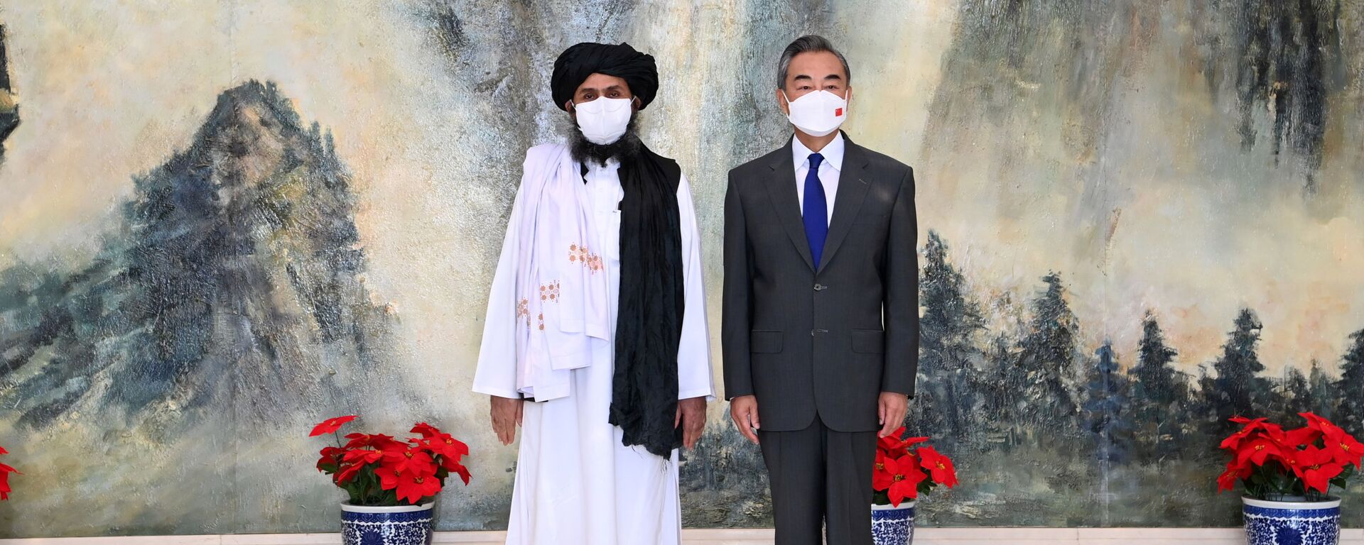 Chinese State Councilor and Foreign Minister Wang Yi meets with Mullah Abdul Ghani Baradar, political chief of Afghanistan's Taliban, in Tianjin, China July 28, 2021. Picture taken July 28, 2021. - Sputnik International, 1920, 30.08.2021
