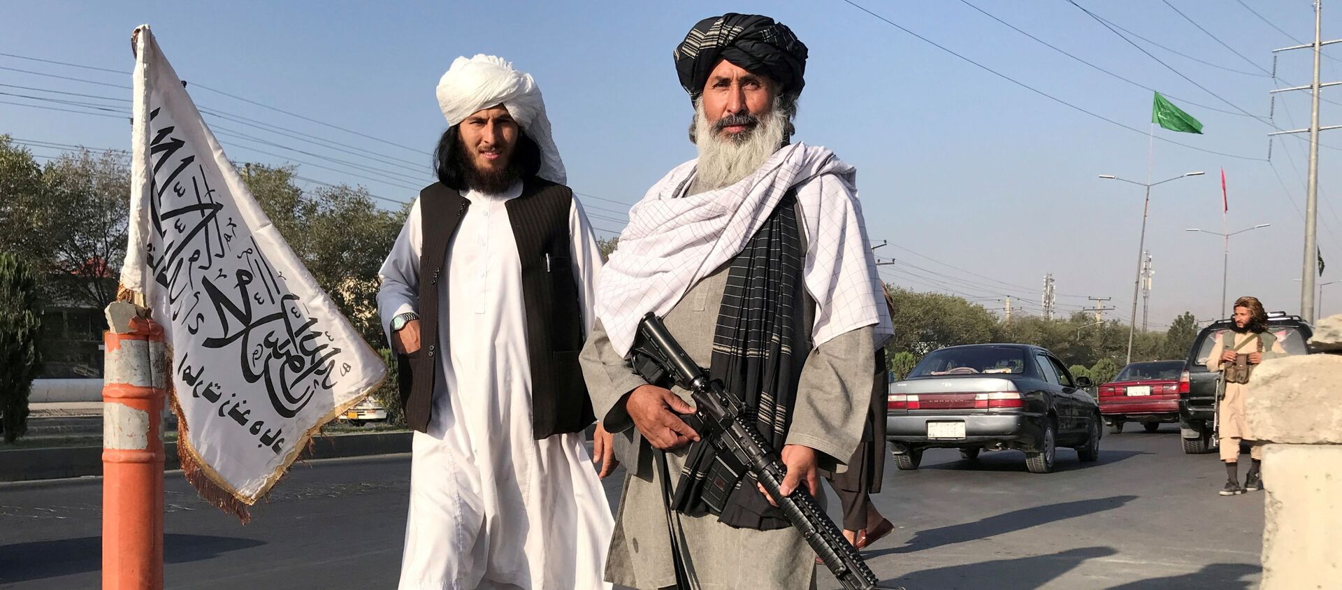 FILE PHOTO: A Taliban fighter holding an M16 assault rifle stands outside the Interior Ministry in Kabul, Afghanistan, August 16, 2021. - Sputnik International, 1920