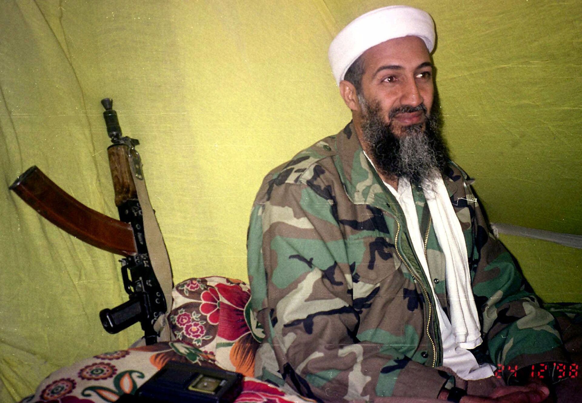 In this Dec. 24, 1998, file photo, al-Qaida leader Osama Bin Laden speaks to a selected group of reporters in mountains of Helmand province in southern Afghanistan.  - Sputnik International, 1920, 07.09.2021
