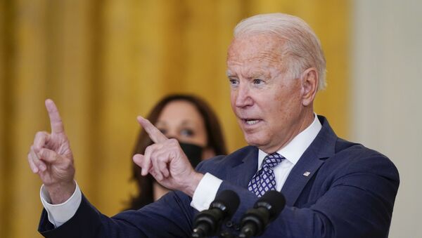 President Joe Biden answers questions from members of the media as he speaks about the evacuation of American citizens, their families, SIV applicants and vulnerable Afghans in the East Room of the White House, Friday, 20 August 2021, in Washington.  - Sputnik International