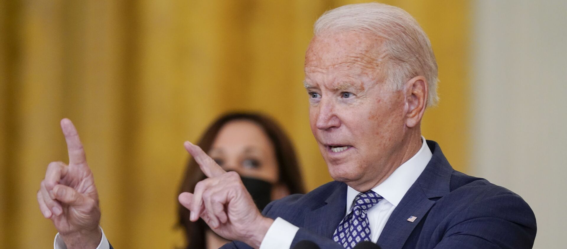 President Joe Biden answers questions from members of the media as he speaks about the evacuation of American citizens, their families, SIV applicants and vulnerable Afghans in the East Room of the White House, Friday, 20 August 2021, in Washington.  - Sputnik International, 1920, 21.08.2021
