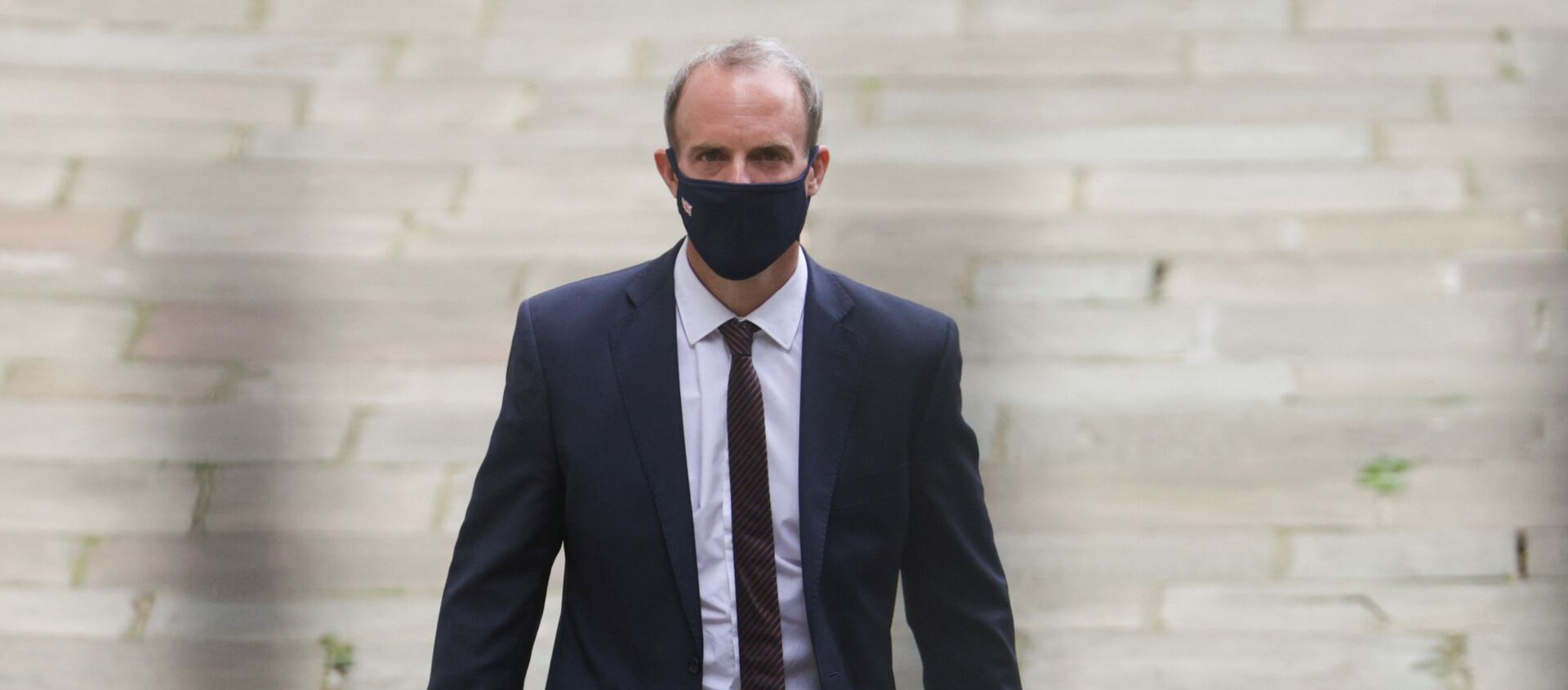 Britain's Foreign Secretary Dominic Raab walks outside Downing Street, in London, Britain, August 16, 2021 - Sputnik International, 1920, 22.08.2021