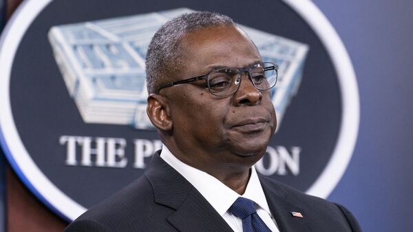 In this Aug. 18, 2021, photo, Secretary of Defense Lloyd Austin pauses while speaking during a media briefing at the Pentagon in Washington. - Sputnik International
