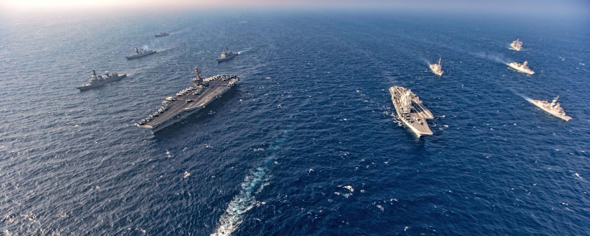 Aircraft carriers and warships participate in the second phase of Malabar naval exercise, a joint exercise comprising of India, US, Japan and Australia, in the Northern Arabian Sea on Tuesday, Nov. 17, 2020. - Sputnik International, 1920, 01.11.2022