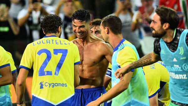 Soccer Football - Italy - Serie A - Udinese v Juventus - Dacia Arena, Udine, Italy - August 22, 2021 Juventus' Cristiano Ronaldo celebrates with teammates after scoring a goal that was later disallowed after a VAR review - Sputnik International