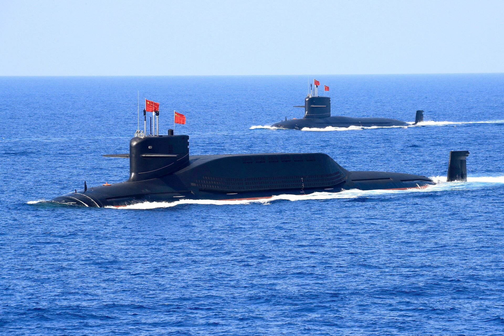 A nuclear-powered Type 094A Jin-class ballistic missile submarine of the Chinese People's Liberation Army (PLA) Navy is seen during a military display in the South China Sea April 12, 2018 - Sputnik International, 1920, 07.09.2021