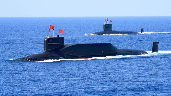 A nuclear-powered Type 094A Jin-class ballistic missile submarine of the Chinese People's Liberation Army (PLA) Navy is seen during a military display in the South China Sea April 12, 2018 - Sputnik International