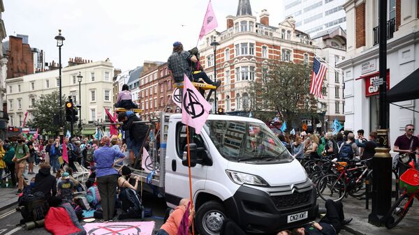Extinction Rebellion climate activists protest in London - Sputnik International