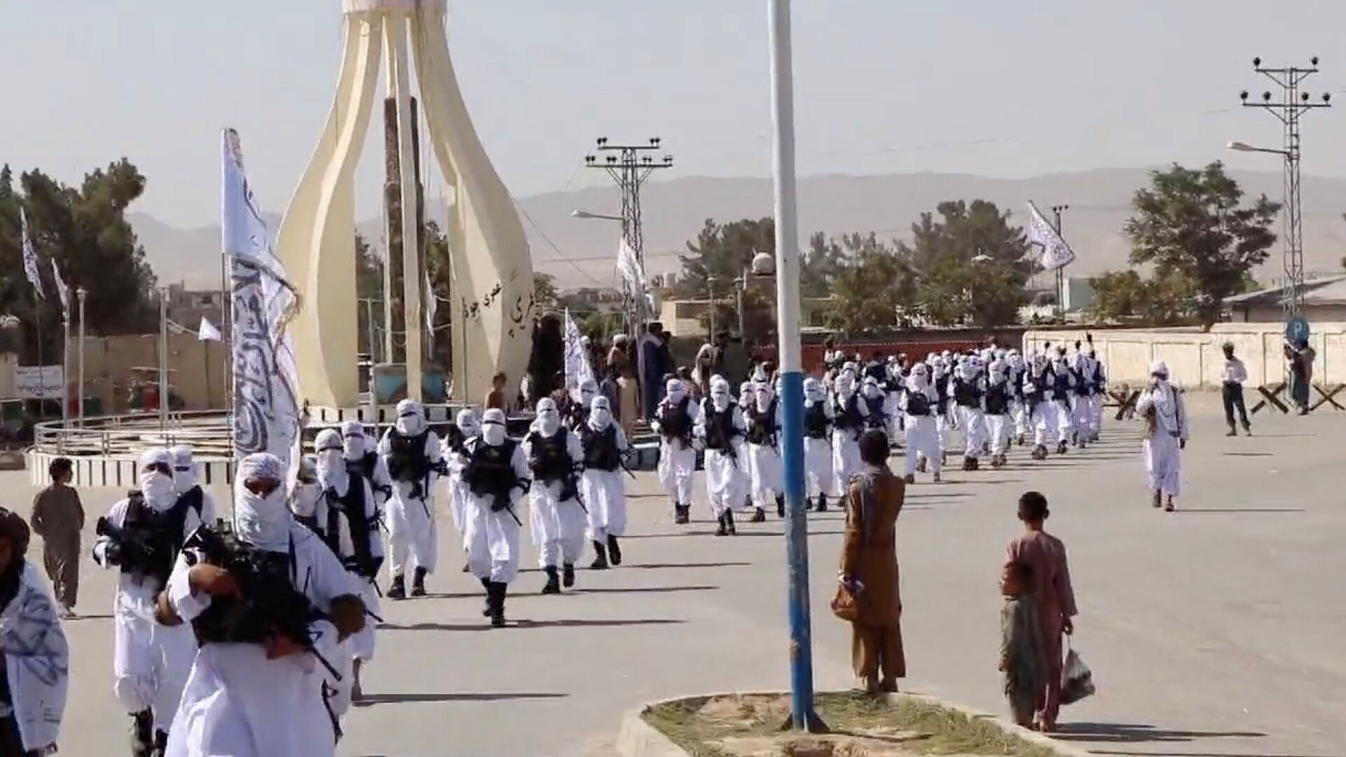 Taliban fighters march in uniforms on the street in Qalat, Zabul Province, Afghanistan, in this still image taken from social media video uploaded August 19, 2021 and obtained by REUTERS - Sputnik International, 1920, 08.09.2021