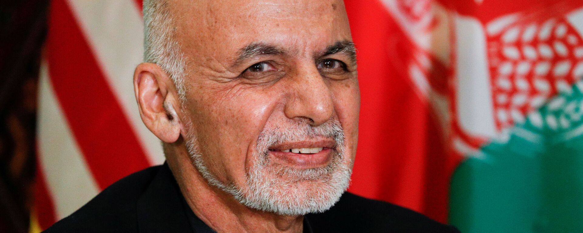 FILE PHOTO: Afghanistan President Ashraf Ghani looks on during a bilateral meeting with U.S. President Donald Trump, during a surprise visit at Bagram Air Base in Afghanistan, November 28, 2019 - Sputnik International, 1920, 25.08.2021