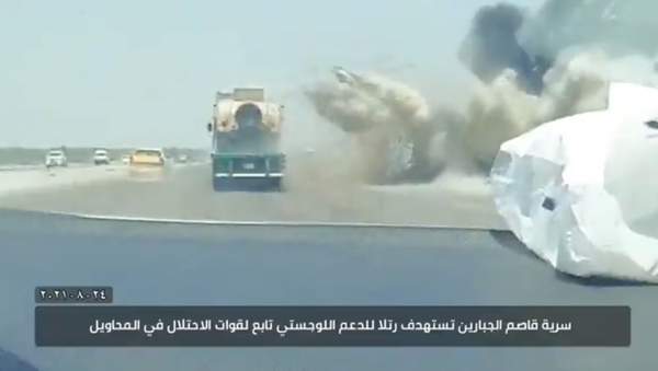 Screengrab of footage of Iraqi militia group attack on US convoy. - Sputnik International