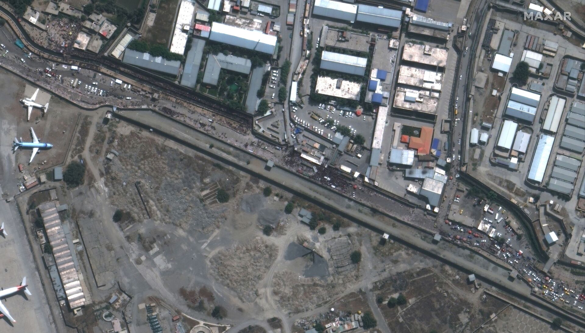 An overview of the Abbey Gate at Hamid Karzai International Airport, in Kabul, Afghanistan August 23, 2021, in this satellite image obtained by Reuters on August 26, 2021. - Sputnik International, 1920, 07.09.2021