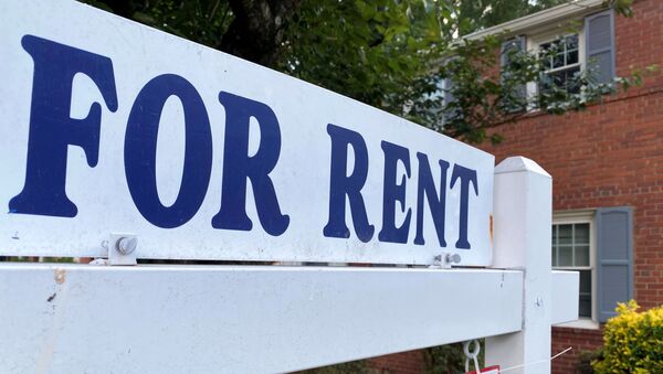 A For Rent sign is placed in front of a home in Arlington, Virginia, U.S., June 8, 2021 - Sputnik International