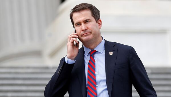 Rep. Seth Moulton (D-MA) descends down the House entrance stairs following the Friends of Ireland reception on Capitol Hill in Washington, U.S., March 12, 2020 - Sputnik International