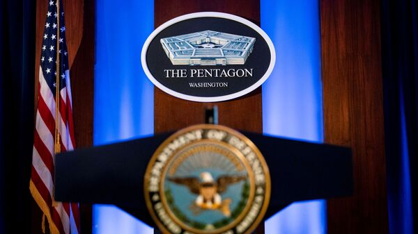 The Pentagon logo is seen behind the podium in the briefing room at the Pentagon in Arlington, Virginia, U.S., January 8, 2020.  - Sputnik International