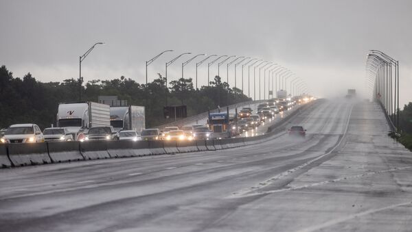 Traffic moves bumper to bumper along I-10 west as residents arrive into Texas from the Louisiana border ahead of Hurricane Ida in Orange, Texas, U.S., August 28, 2021 - Sputnik International