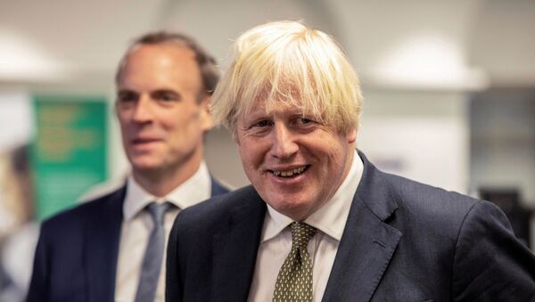 Britain's Prime Minister Boris Johnson and Foreign Secretary Dominic Raab visit FCDO Crisis Centre in London - Sputnik International