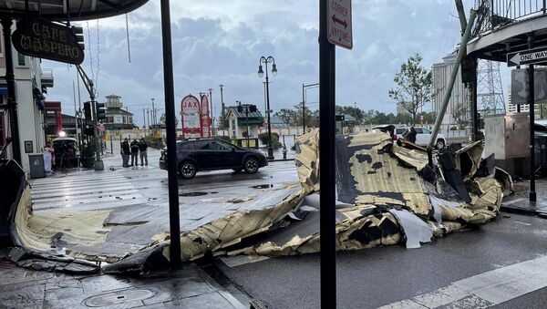 The roof of a building next to Jax Brewery lies on the ground after it was blown off due to strong winds from Hurricane Ida in New Orleans, Louisiana, U.S., August 30, 2021. - Sputnik International
