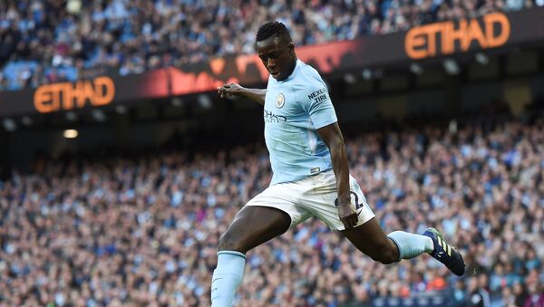 (FILES) In this file photo taken on April 22, 2018 Manchester City's French defender Benjamin Mendy crosses the ball during the English Premier League football match between Manchester City and Swansea at the Etihad Stadium in Manchester, north west England, on April 22, 2018 - Sputnik International
