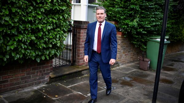 Britain's Labour Party leader Keir Starmer leaves his home in London - Sputnik International