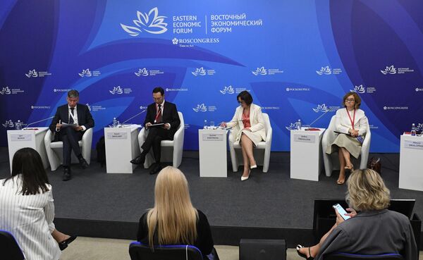 Participants of the Creative Industries for Economic Breakthrough: Regional Experience session at the Eastern Economic Forum in Vladivostok. From left to right: Igor Nosov, acting general director of the Far East and Arctic Development Corporation JSC; Aisen Nikolayev, acting head of the Republic of Sakha (Yakutia); Gulnaz Kadyrova, deputy minister of industry and trade of the Russian Federation; and Zelfira Tregulova, general director of the State Tretyakov Gallery. - Sputnik International