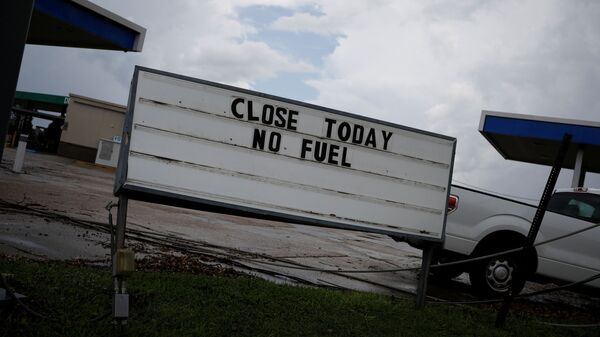 A sign that reads Close Today. No Fuel is seen at a gas station after Hurricane Ida made landfall in Louisiana, in Houma, Louisiana, U.S. September 1, 2021. REUTERS/Marco Bello - Sputnik International