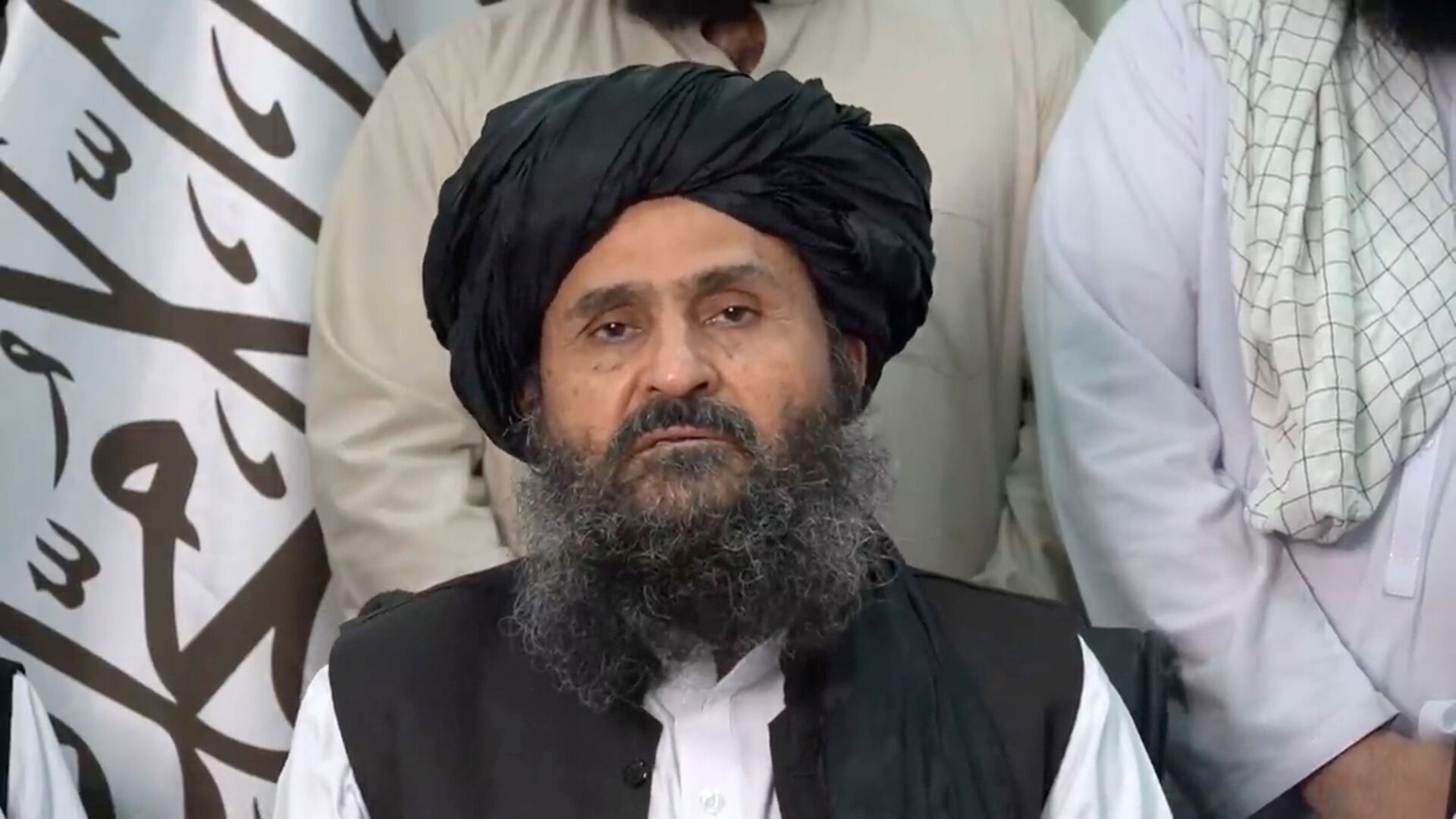 Mullah Baradar Akhund, a senior official of the Taliban, makes a video statement, in a still image taken from a video recorded in an unidentified location and released on August 16, 2021 - Sputnik International, 1920, 07.09.2021