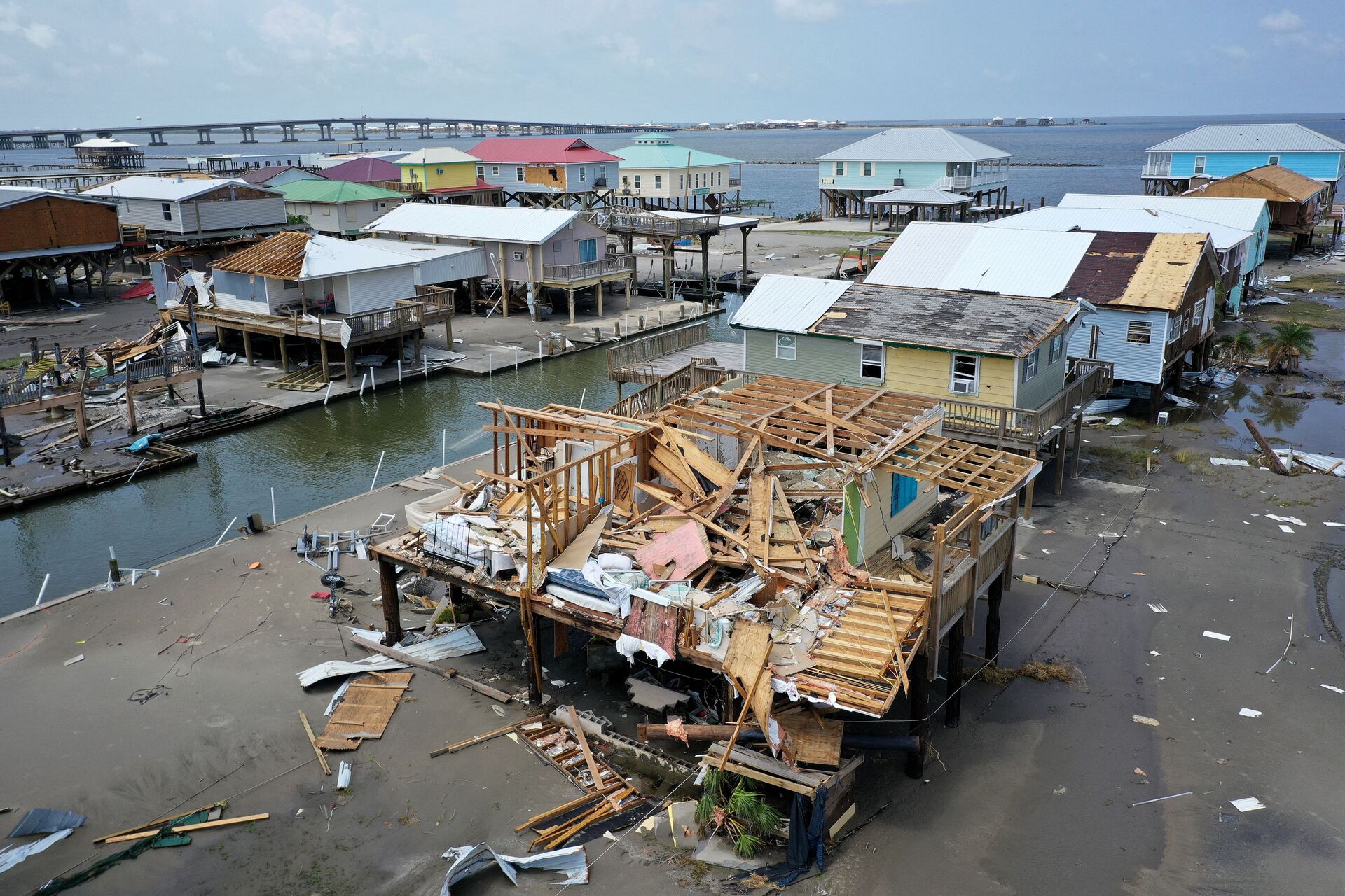 Homes destroyed in the wake of Hurricane Ida are shown September 2, 2021 in Grand Isle, Louisiana. Ida made landfall August 29 as a Category 4 storm near Grand Isle, southwest of New Orleans, causing widespread power outages, flooding and massive damage.   - Sputnik International, 1920, 07.09.2021