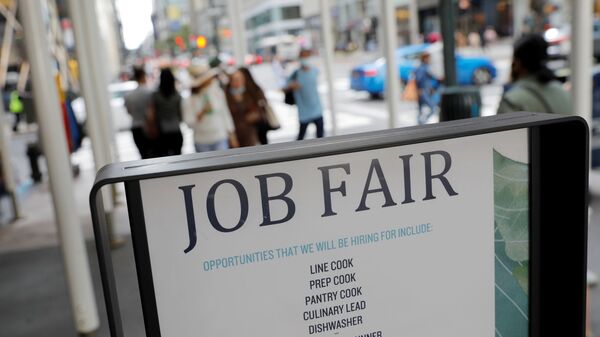 Signage for a job fair is seen on 5th Avenue after the release of the jobs report in Manhattan, New York City, U.S., September 3, 2021.  - Sputnik International