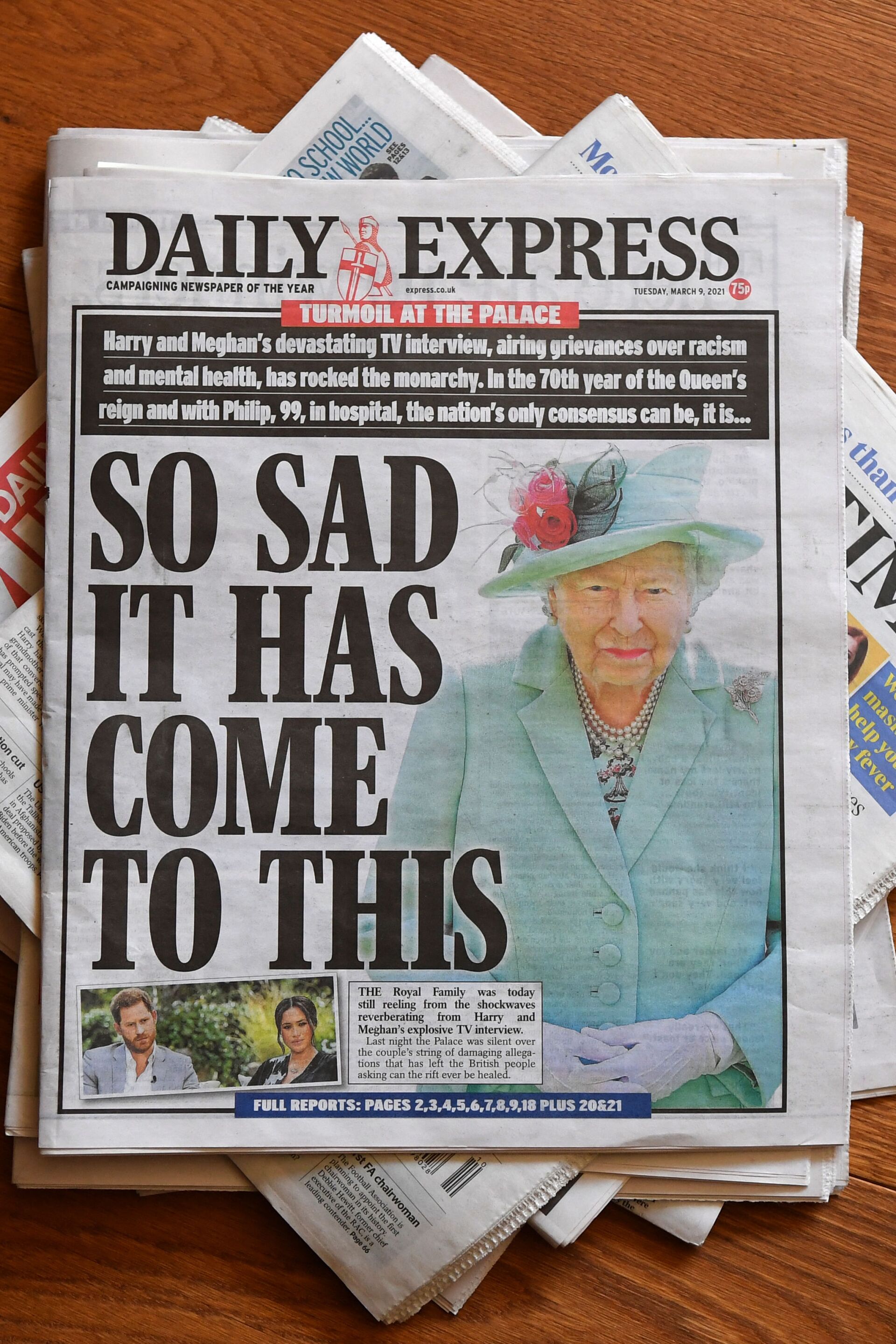 An arrangement of UK daily newspapers photographed as an illustration in Brenchley, Kent on March 9, 2021, shows front page headlines reporting on the story of the interview given by Meghan, Duchess of Sussex, wife of Britain's Prince Harry, Duke of Sussex, to Oprah Winfrey, which aired on UK broadcaster ITV. - Sputnik International, 1920, 07.09.2021