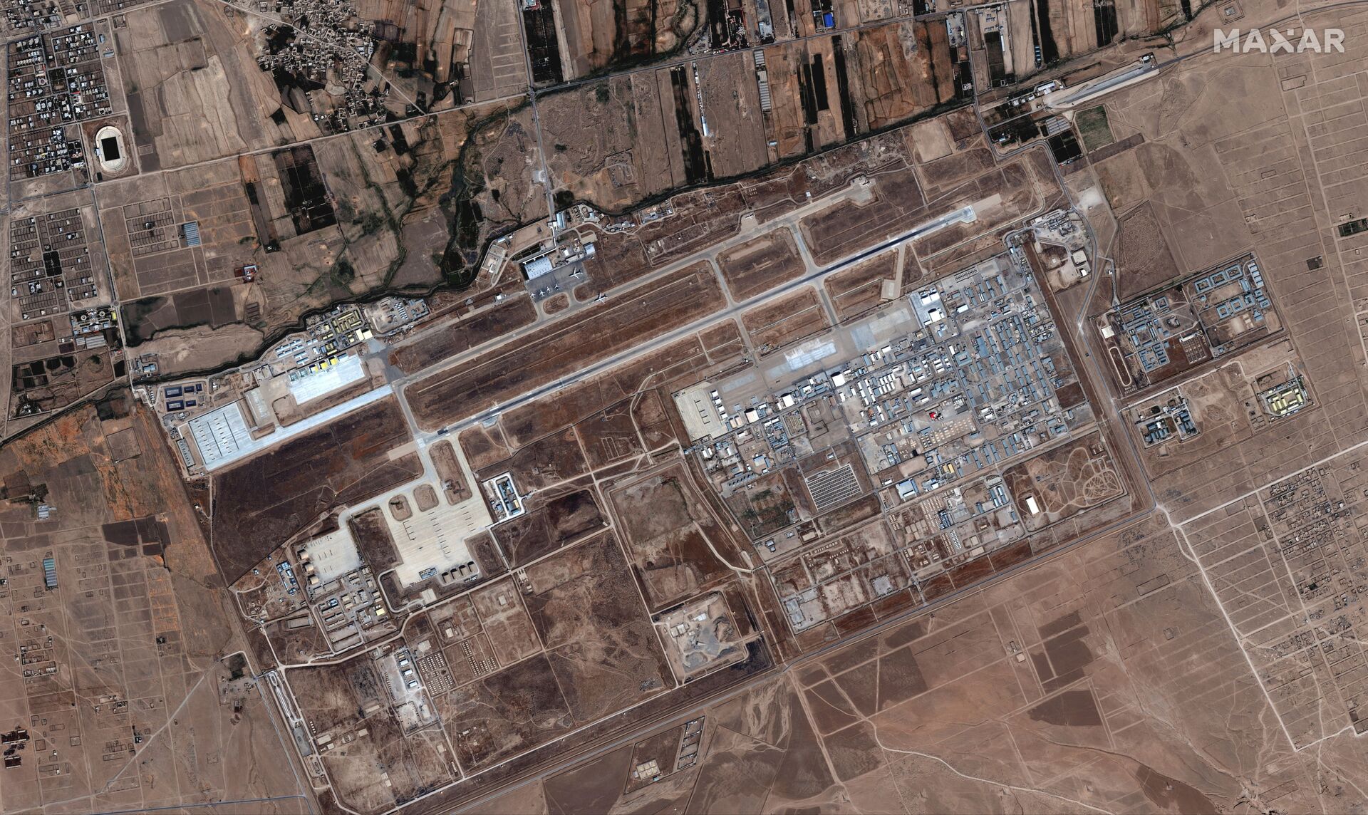 Six commercial airplanes are seen near the main terminal of the Mazar-i-Sharif airport, in northern Afghanistan, September 3 2021. Picture taken September 3, 2021. - Sputnik International, 1920, 07.09.2021