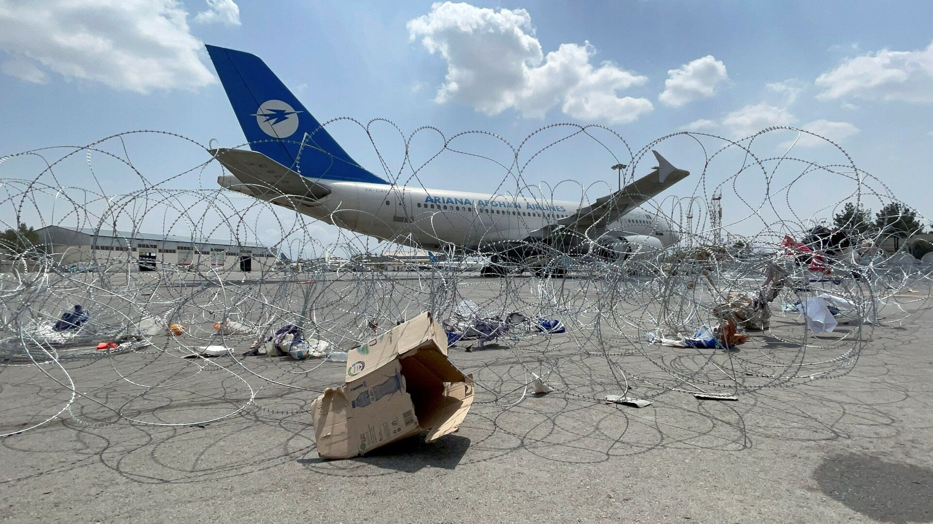 A commercial airplane is seen at the Hamid Karzai International Airport a day after U.S troops withdrawal in Kabul, Afghanistan August 31, 2021 - Sputnik International, 1920, 13.12.2021