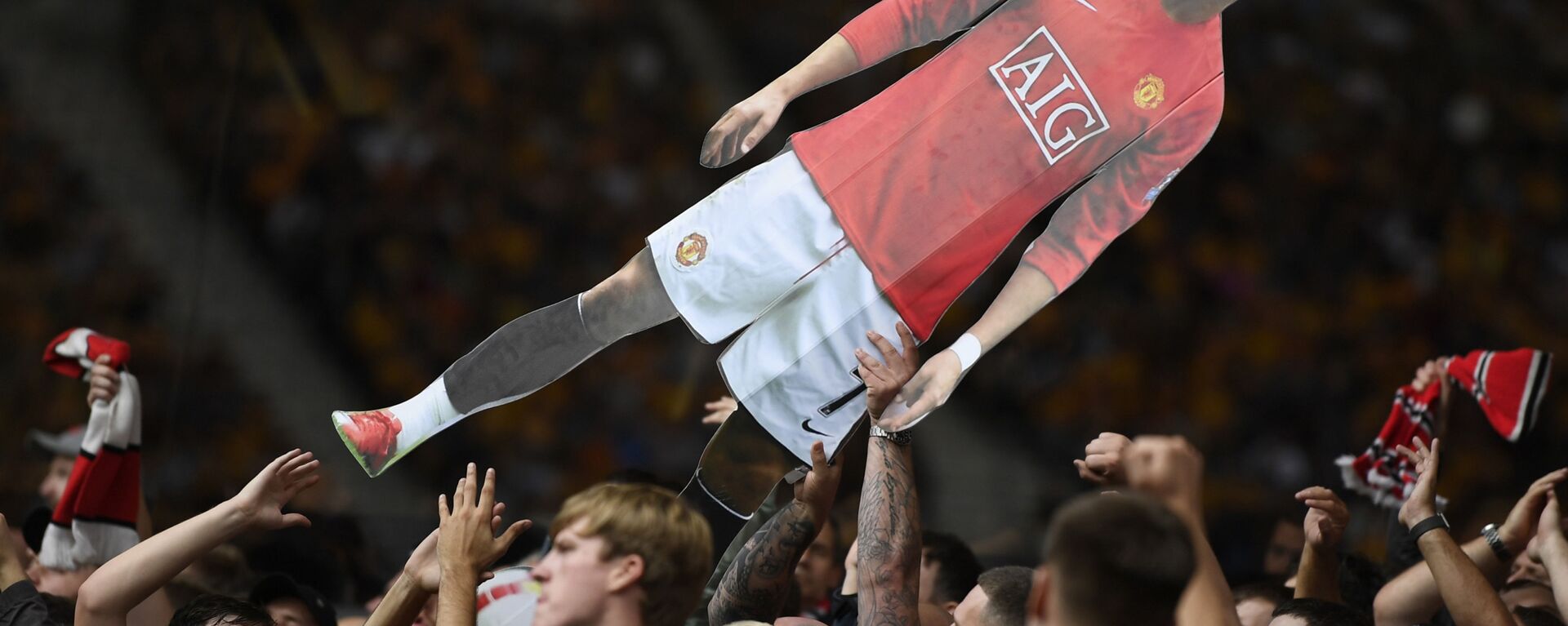 Soccer Football - Premier League - Wolverhampton Wanderers v Manchester United - Molineux Stadium, Wolverhampton, Britain - 29 August 2021 General view of Manchester United fans holding up a cardboard cut out of Cristiano Ronaldo - Sputnik International, 1920, 06.09.2021