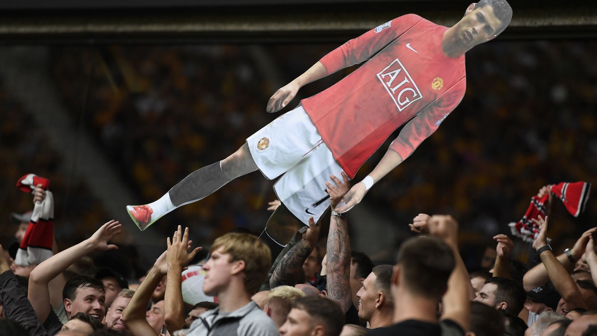 Soccer Football - Premier League - Wolverhampton Wanderers v Manchester United - Molineux Stadium, Wolverhampton, Britain - 29 August 2021 General view of Manchester United fans holding up a cardboard cut out of Cristiano Ronaldo - Sputnik International, 1920, 06.09.2021