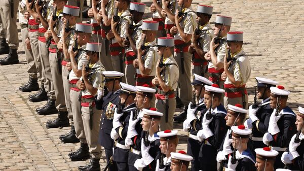 French military troops stand during the prise d'armes military ceremony in the courtyard of the Invalides, in Paris on July 8, 2021.  - Sputnik International