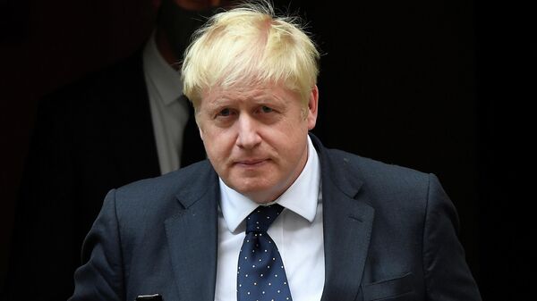 Britain's Prime Minister Boris Johnson leaves Downing Street, ahead of addressing lawmakers about Britain's withdrawal from Afghanistan, in London, Britain, September 6, 2021 - Sputnik International