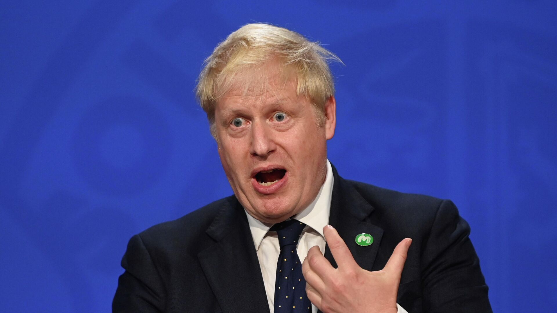 Britain's Prime Minister Boris Johnson gestures as he speaks during a news conference with Britain's Chancellor of the Exchequer Rishi Sunak and Britain's Health Secretary Sajid Javid (not pictured) in Downing Street, in London, Britain, September 7, 2021 - Sputnik International, 1920, 05.10.2021