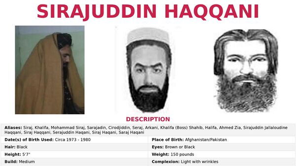 The 'Seeking Information' poster issued by the U.S. Federal Bureau of Investigation for Sirajuddin Haqqani, who is Afghanistan's newly appointed acting interior minister - Sputnik International