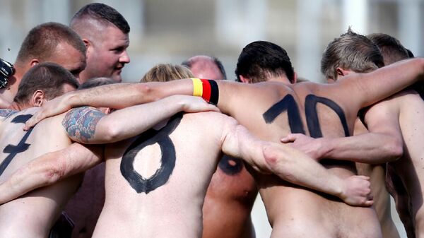 Germany's naked football team, pictured taking part in a match against the Netherlands in 2020 - Sputnik International