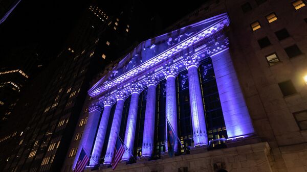 The New York Stock Exchange is lit up in purple to celebrate the launch of the International Paralympic Committee’s WeThe15 campaign on August 19, 2021 in New York City. - Sputnik International