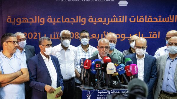Members of Morocco's Islamist Justice and Development Party (PJD) hold a press conference in the capital Rabat to announce the resignation of its president Saad-Eddine el-Othmani and all members of its general secretariat, after it came in 8th in parliamentary and local elections, on September 9, 2021. - Sputnik International