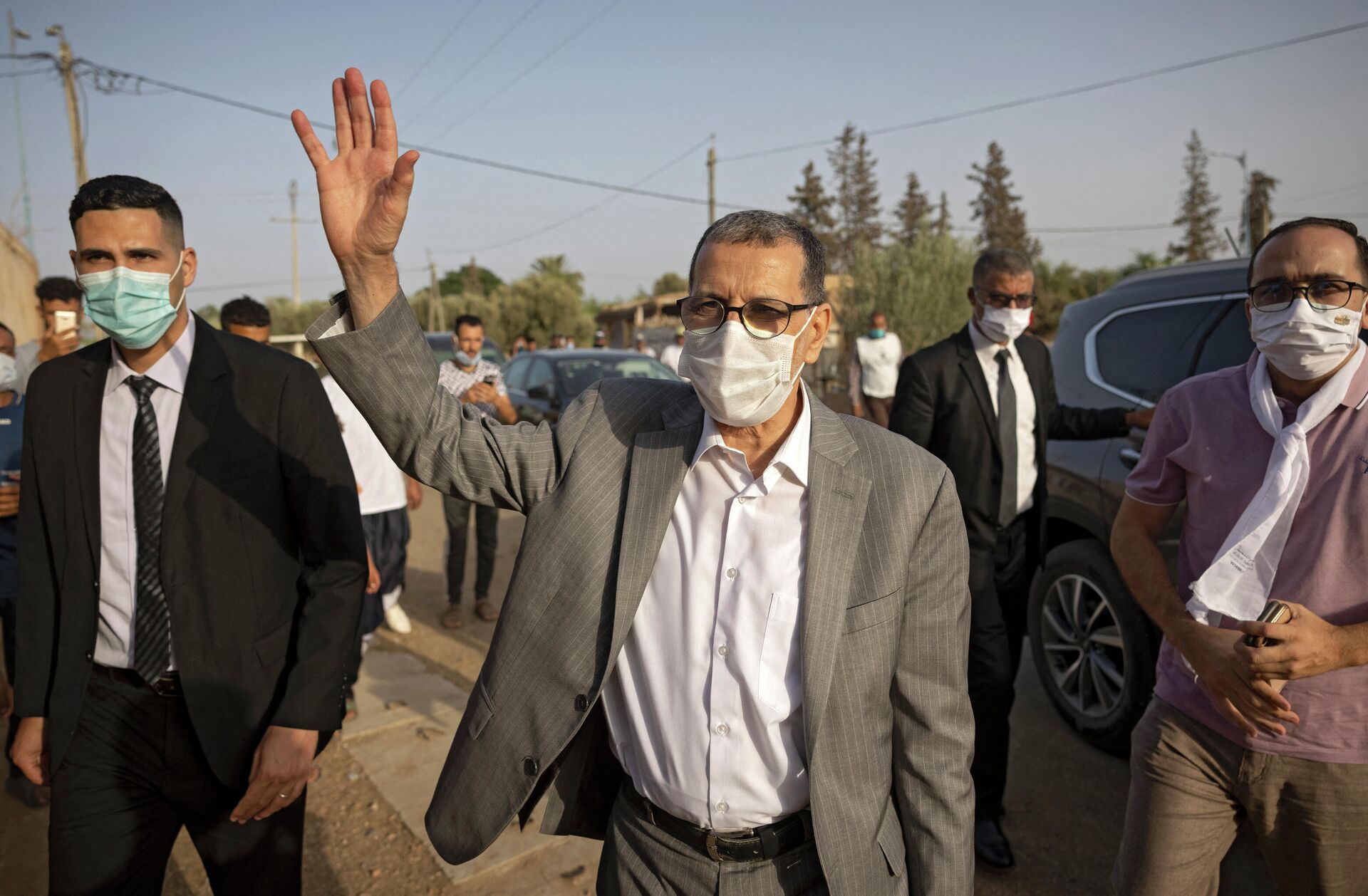 Saad-Eddine El Othmani , Morocco's Prime Minister and President of the Islamist Justice and Development Party (PJD), greets people during a campaign meeting in Sidi Slimane, some 120 kms from Rabat, on August 27, 2021, ahead of the upcoming elections. - Sputnik International, 1920, 10.09.2021