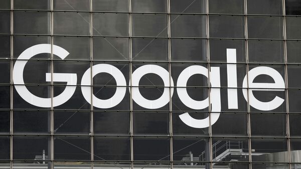 The logo of Google is seen on a building at La Defense business and financial district in Courbevoie near Paris, France, September 1, 2020. - Sputnik International