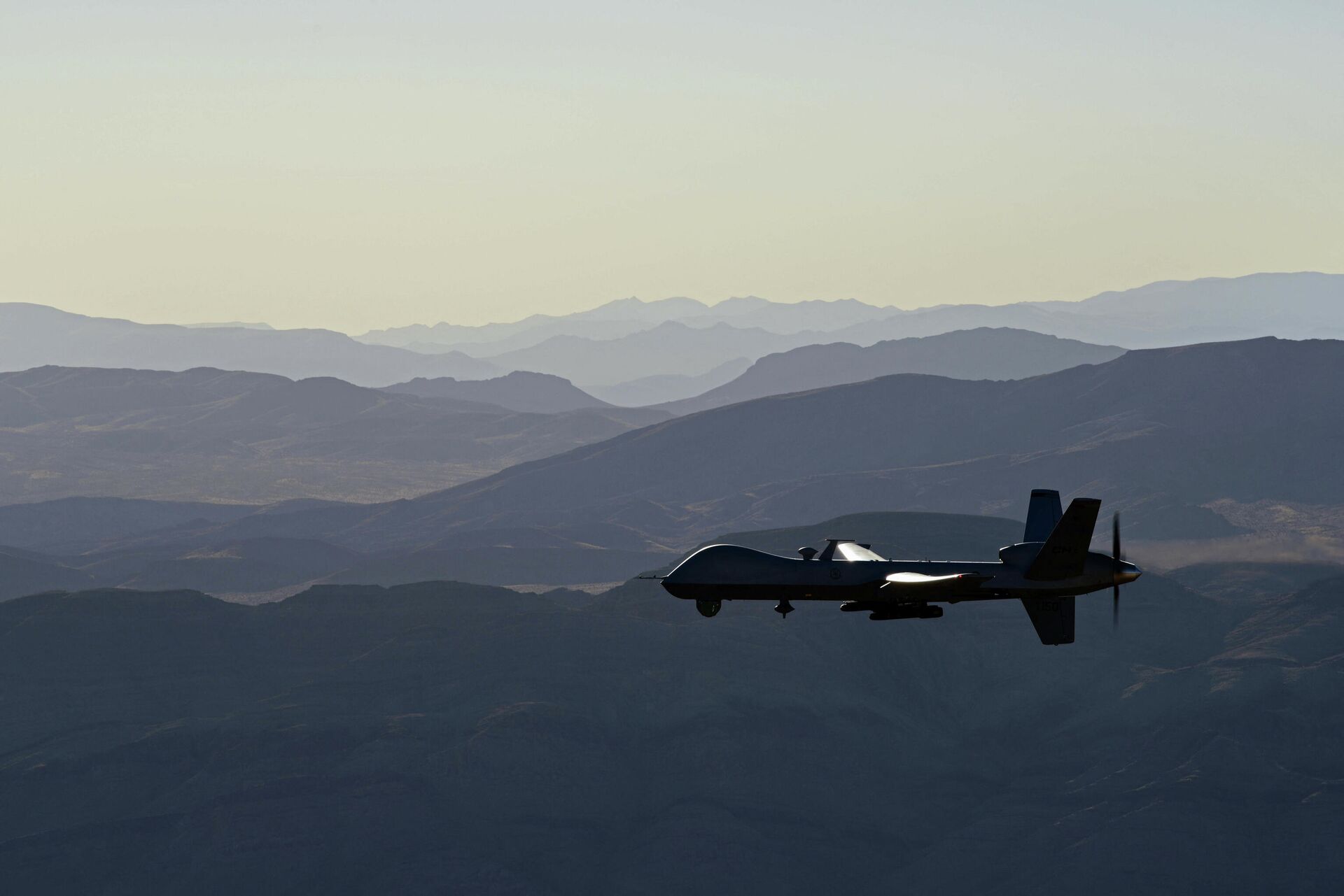 This handout photo courtesy of the US Air Force obtained on November 7, 2020 shows an armed MQ-9 Reaper unmanned aerial vehicle (UAV or drone) as it flies over the Nevada Test and Training Range on July 15, 2019. - Sputnik International, 1920, 18.09.2021
