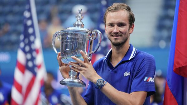 Sep 12, 2021; Flushing, NY, USA; Daniil Medvedev of Russia celebrates with the championship trophy after his match against Novak Djokovic of Serbia (not pictured) in the men's singles final on day fourteen of the 2021 U.S. Open tennis tournament at USTA Billie Jean King National Tennis Center. - Sputnik International