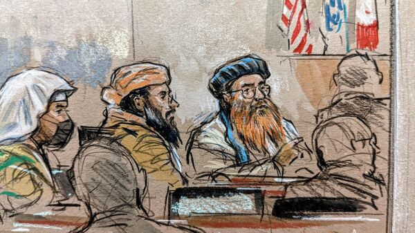 This courtroom sketch screened by US Military officials on September 7, 2021 shows accused September 11, 2001 mastermind Khalid Sheikh Mohammed (R) along with co-defendants Ramzi bin al-Shibh (L) and Walid bin Attash (C) appearing for a pretrial hearing at the military commission's court at the US naval base in Guantanamo, Cuba, on September 7, 2021.  - Sputnik International