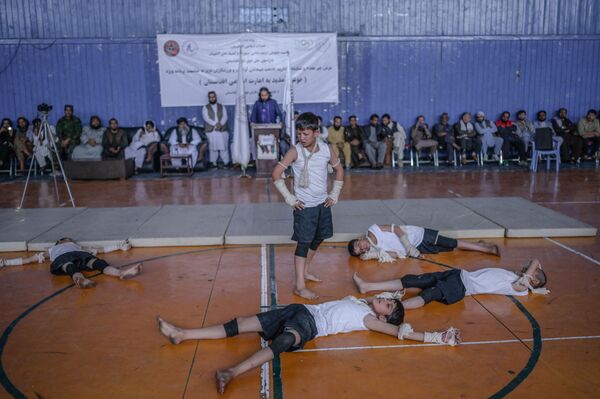Youths show their skills during an event organised for the visit of the Taliban&#x27;s director of physical education and sports, Bashir Ahmad Rustamzai, at a gymnasium in Kabul on 14 September 2021. - Sputnik International