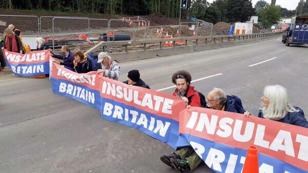 Members of Insulate Britain protest on M25 Motorway, Britain September 15, 2021, in this still image taken from a handout video - Sputnik International