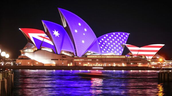 The flags of the US and Australia are projected onto the sails of the Opera House to commemorate the 70th anniversary of the alliance between Australia, New Zealand and the US known as the ANZUS Treaty in Sydney on September 1, 2021 - Sputnik International